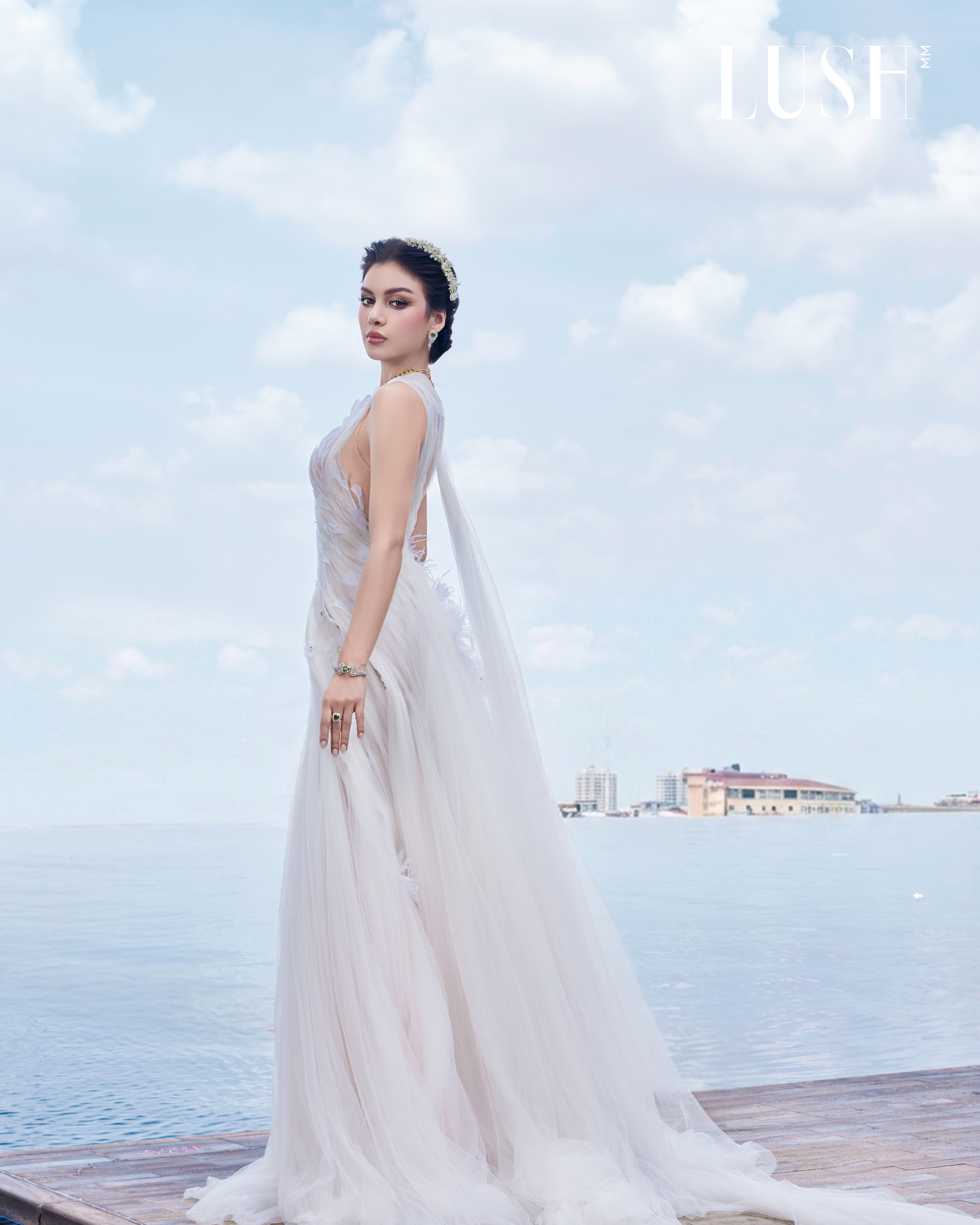 The Girl Who Wears Jasmine – White Look Thet San wearing a white couture gown by The Atelier by Thein Zaw Win for LUSH Magazine's July 2026 Cover Story, "The Girl Who Wears Jasmine."